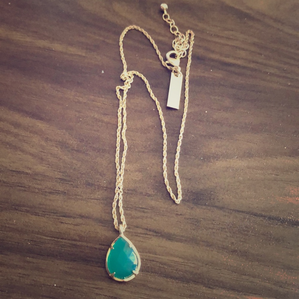 Kendra Scott gold necklace with green stone